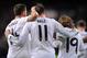 MADRID, SPAIN - NOVEMBER 30: Gareth Bale of Real Madrid CF celebrates with Xabi Alonso (L) and Luka Modric after scoring Real's 4th goal and his hat-trick during the La Liga match between Real Madrid CF and Real Valladolid CF at Santiago Bernabeu stadium
