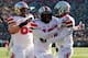 ANN ARBOR, MI - NOVEMBER 30: Quarterback Braxton Miller #5 celebrates a third quarter touchdown with wide receiver Philly Brown #10 and offensive linesman Pat Elflein #65 of the Ohio State Buckeyes against the Michigan Wolverines during a game at Michigan