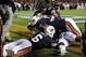 Nov 30, 2013; Auburn, AL, USA; Auburn Tigers cornerback Chris Davis (bottom) celebrates with defensive back Jonathon Mincy (6) and teammates after returning a missed field goal for a 100 yard touchdown during the fourth quarter at Jordan Hare Stadium. Aub