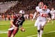 Nov 30, 2013; Columbia, SC, USA; South Carolina Gamecocks quarterback Connor Shaw (14) rushes for a touchdown as Clemson Tigers linebacker Stephone Anthony (42) pursues in the first quarter at Williams-Brice Stadium. Mandatory Credit: Jeff Blake-USA TODAY