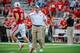 LINCOLN, NE - SEPTEMBER 7: Nebraska Cornhuskers head coach Bo Pelini greets his players before their game against the Southern Miss Golden Eagles at Memorial Stadium on September 7, 2013 in Lincoln, Nebraska. (Photo by Eric Francis/Getty Images)