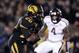Nov 30, 2013; Columbia, MO, USA; Missouri Tigers running back Henry Josey (20) runs the ball as Texas A&M Aggies defensive back Toney Hurd Jr. (4) defends during the first half of the game at Faurot Field. Mandatory Credit: Denny Medley-USA TODAY Sports