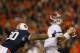 AUBURN, AL - NOVEMBER 30: AJ McCarron #10 of the Alabama Crimson Tide is pressured by Dee Ford #30 of the Auburn Tigers in the third quarter at Jordan-Hare Stadium on November 30, 2013 in Auburn, Alabama. (Photo by Kevin C. Cox/Getty Images)