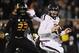 Nov 30, 2013; Columbia, MO, USA; Texas A&M Aggies quarterback Johnny Manziel (2) scrambles as Missouri Tigers defensive lineman Markus Golden (33) attempts the tackle during the second half of the game at Faurot Field. Missouri win 28-21. Mandatory Credit