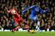 LONDON, ENGLAND - DECEMBER 01: Nathaniel Clyne of Southampton tackles Demba Ba of Chelsea during the Barclays Premier League match between Chelsea and Southampton at Stamford Bridge on December 1, 2013 in London, England. (Photo by Ian Walton/Getty Imag