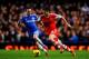 LONDON, ENGLAND - DECEMBER 01: Adam Lallana of Southampton evades Juan Mata of Chelsea during the Barclays Premier League match between Chelsea and Southampton at Stamford Bridge on December 1, 2013 in London, England. (Photo by Mike Hewitt/Getty Images