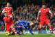 LONDON, ENGLAND - DECEMBER 01: Luke Shaw of Southampton (L) battles with Fernando Torres of Chelsea as Dejan Lovren of Southampton (R) moves in during the Barclays Premier League match between Chelsea and Southampton at Stamford Bridge on December 1, 201