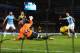 MANCHESTER, ENGLAND - DECEMBER 01: Samir Nasri of Manchester City scores his team's second goal during the Barclays Premier League match between Manchester City and Swansea City at Etihad Stadium on December 1, 2013 in Manchester, England. (Photo by Cli