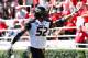ATHENS, GA - OCTOBER 12: Michael Sam #52 of the Missouri Tigers recovers a fumble for a touchdown against the Georgia Bulldogs at Sanford Stadium on October 12, 2013 in Athens, Georgia. (Photo by Kevin C. Cox/Getty Images)