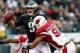 PHILADELPHIA, PA - DECEMBER 01: Nick Foles #9 of the Philadelphia Eagles is pressured by Matt Shaughnessy #91 of the Arizona Cardinals on December 1, 2013 at Lincoln Financial Field in Philadelphia, Pennslyvania.The Philadelphia Eagles defeated the Arizo