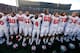 ANN ARBOR, MI - NOVEMBER 30: The Ohio State Buckeyes celebrate on the field after defeating the Michigan Wolverines 42-41 at Michigan Stadium on November 30, 2013 in Ann Arbor, Michigan. (Photo by Gregory Shamus/Getty Images)