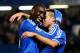 LONDON, ENGLAND - DECEMBER 01: Demba Ba of Chelsea (L) celebrates with Cesar Azpilicueta (R) as he scores their third goal during the Barclays Premier League match between Chelsea and Southampton at Stamford Bridge on December 1, 2013 in London, England.