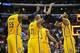 December 1, 2013; Los Angeles, CA, USA; Indiana Pacers center Roy Hibbert (55), power forward David West (21) and small forward Paul George (24) celebrate the 105-100 victory against the Los Angeles Clippers at Staples Center. Mandatory Credit: Gary A. V