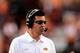 AUSTIN, TX - NOVEMBER 16: Mike Gundy, head coach of the Oklahoma State Cowboys, calls a play against the Texas Longhorns during a game at Darrell K Royal-Texas Memorial Stadium on November 16, 2013 in Austin, Texas. Oklahoma State won the game 38-13.