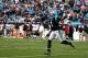 CHARLOTTE, NC - DECEMBER 01: Cam Newton #1 of the Carolina Panthers celebrates after a touchdown against the Tampa Bay Buccaneers during their game at Bank of America Stadium on December 1, 2013 in Charlotte, North Carolina. (Photo by Streeter Lecka/Get