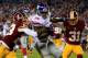 LANDOVER, MD - DECEMBER 01: Andre Brown #35 of the New York Giants runs the ball in for a touchdown in the second quarter against DeAngelo Hall #23 and Brandon Meriweather #31 of the Washington Redskins during their game at FedExField on December 1, 2013
