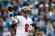 CHARLOTTE, NC - DECEMBER 01: Mike Glennon #8 of the Tampa Bay Buccaneers drops back to pass against the Carolina Panthers during their game at Bank of America Stadium on December 1, 2013 in Charlotte, North Carolina. (Photo by Streeter Lecka/Getty Imag