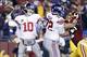 Dec 1, 2013; Landover, MD, USA; New York Giants quarterback Eli Manning (10) prepares to throw the ball against the Washington Redskins in the second quarter at FedEx Field. Mandatory Credit: Geoff Burke-USA TODAY Sports