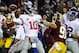 Dec 1, 2013; Landover, MD, USA; New York Giants quarterback Eli Manning (10) attempts a pass as Washington Redskins linebacker Ryan Kerrigan (91) rushes during the first half at FedEx Field. Mandatory Credit: Brad Mills-USA TODAY Sports