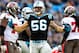 CHARLOTTE, NC - DECEMBER 01: A.J. Klein #56 of the Carolina Panthers reacts after sacking quarterback Mike Glennin #8 of the Tampa Bay Buccaneers during play at Bank of America Stadium on December 1, 2013 in Charlotte, North Carolina. The Panthers won 27