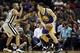 Nov 8, 2013; San Antonio, TX, USA; Golden State Warriors guard Klay Thompson (11) is defended by San Antonio Spurs guard Tony Parker (9) during the first half at AT&T Center. Mandatory Credit: Soobum Im-USA TODAY Sports