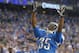 DETROIT, MI - NOVEMBER 28: Joique Bell #35 of the Detroit Lions celebrates late in the fourth quarter of the game against the Green Bay Packers at Ford Field on November 28, 2013 in Detroit, Michigan. The Lions defeated the Packers 40-10. (Photo by Leon