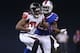 TORONTO, ON - DECEMBER 1: Roddy White #84 of the Atlanta Falcons is tackled after catching a pass during an NFL game by Leodis McKelvin #21 of the Buffalo Bills at Rogers Centre on December 1, 2013 in Toronto, Ontario. (Photo by Tom Szczerbowski/Getty Ima