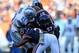 CHICAGO, IL - NOVEMBER 10: Jonathan Bostic #57 and Major Wright #21 of the Chicago Bears tackle Reggie Bush #21 of the Detroit Lions at Soldier Field on November 10, 2013 in Chicago, Illinois. (Photo by Jonathan Daniel/Getty Images)