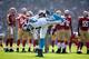 SAN FRANCISCO, CA - NOVEMBER 10: Cam Newton #1 of the Carolina Panthers streches during a timeout of their game against the San Francisco 49ers at Candlestick Park on November 10, 2013 in San Francisco, California. (Photo by Ezra Shaw/Getty Images)