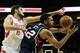 HOUSTON, TX - NOVEMBER 27: Omri Casspi #18 of the Houston Rockets fights for a rebound with Mike Scott #32 of the Atlanta Hawks during the game at Toyota Center on November 27, 2013 in Houston, Texas. NOTE TO USER: User expressly acknowledges and agrees
