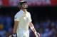 BRISBANE, AUSTRALIA - NOVEMBER 21: Steve Smith of Australia looks dejected after being dismissed by Chris Tremlett of England during day one of the First Ashes Test match between Australia and England at The Gabba on November 21, 2013 in Brisbane, Austra