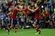ALBACETE, SPAIN - OCTOBER 15: Francisco Alarcon alias Isco (L) closes his eyes as he celebrates with his teammate Andres Iniesta (R) during the FIFA 2014 World Cup Qualifier match between Spain and Georgia at Carlos Belmonte stadium on October 15, 2013 i