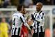 NEWCASTLE UPON TYNE, ENGLAND - NOVEMBER 30: Yoan Gouffran of Newcastle United celebrates scoring the opening goal with team-mate Yohan Cabaye during the Barclays Premier League match between Newcastle United and West Bromwich Albion at St James' Park on