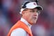 FAYETTEVILLE, AR - NOVEMBER 2: Head Coach Gus Malzahn of the Auburn Tigers watches a replay during a game against the Arkansas Razorbacks at Razorback Stadium on November 2, 2013 in Fayetteville, Arkansas. The Tigers defeated the Razorbacks 35-17. (Pho