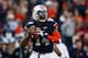 AUBURN, AL - NOVEMBER 30: Nick Marshall #14 of the Auburn Tigers looks to pass against the Alabama Crimson Tide in the first half at Jordan-Hare Stadium on November 30, 2013 in Auburn, Alabama. (Photo by Kevin C. Cox/Getty Images)