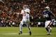 AUBURN, AL - NOVEMBER 30: AJ McCarron #10 of the Alabama Crimson Tide looks to pass against the defense of Dee Ford #30 of the Auburn Tigers in the third quarter at Jordan-Hare Stadium on November 30, 2013 in Auburn, Alabama. (Photo by Kevin C. Cox/Gett