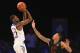 Nov 30, 2013; Paradise Island, BAHAMAS; Kansas Jayhawks guard Andrew Wiggins (22) shoots over UTEP Miners guard McKenzie Moore (13) during the first half at the 2013 Battle 4 Atlantis in the Imperial Arena at the Atlantis Resort. Mandatory Credit: Kevin