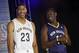METAIRIE, LA - AUGUST 1: Anthony Davis #23 and Jrue Holiday #11 of the New Orleans Pelicans models during a press conference to showcase the team's new uniform on August 1, 2013 at the New Orleans Pelicans practice facility in Metairie, Louisiana. NOTE T