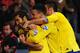 CARDIFF, WALES - NOVEMBER 30: Mathieu Flamini of Arsenal (L) celebrates with Laurent Koscielny (C) and Olivier Giroud (R) as he scores their second goal during the Barclays Premier League match between Cardiff City and Arsenal at Cardiff City Stadium on