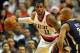Dec 2, 2013; Portland, OR, USA; Portland Trail Blazers power forward LaMarcus Aldridge (12) makes a move to the basket on Indiana Pacers power forward David West (21) during the fourth quarter of the game at the Moda Center. Aldridge scored 28 points as t