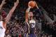 PORTLAND, OR - DECEMBER 2: Paul George #24 of the Indiana Pacers shoots against the Portland Trail Blazers on December 2, 2013 at the Moda Center Arena in Portland, Oregon. NOTE TO USER: User expressly acknowledges and agrees that, by downloading and or u