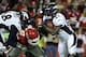 Dec 1, 2013; Kansas City, MO, USA; Denver Broncos running back Knowshon Moreno (27) is tackled by Kansas City Chiefs defensive end Allen Bailey (97) in the second half at Arrowhead Stadium. Denver won the game 35-28. Mandatory Credit: John Rieger-USA TODA