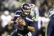 Dec 2, 2013; Seattle, WA, USA; Seattle Seahawks quarterback Russell Wilson (3) looks to pass against the New Orleans Saints during the first quarter at CenturyLink Field. Mandatory Credit: Joe Nicholson-USA TODAY Sports