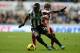 NEWCASTLE UPON TYNE, ENGLAND - NOVEMBER 30: Cheik Tiote of Newcastle United competes with Billy Jones of West Bromwich Albion during the Barclays Premier League match between Newcastle United and West Bromwich Albion at St James' Park on November 30, 201