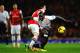 LONDON, ENGLAND - NOVEMBER 02: Mamadou Sakho of Liverpool battles for the ball with Tomas Rosicky of Arsenal during the Barclays Premier League match between Arsenal and Liverpool at Emirates Stadium on November 2, 2013 in London, England. (Photo by La