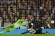 LONDON, ENGLAND - NOVEMBER 30: Stefanos Athanasiadis of PAOK FC scores their second goal past Heurelho Gomes of Spurs during the UEFA Europa League Group A between Tottenham Hotspur and PAOK Salonika match at White Hart Lane on November 30, 2011 in Londo