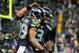 Dec 2, 2013; Seattle, WA, USA; Seattle Seahawks quarterback Russell Wilson (3) celebrates with wide receiver Doug Baldwin (89) after teaming up on a touchdown pass against the New Orleans Saints during the second quarter at CenturyLink Field. Mandatory Cr