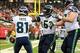 Nov 10, 2013; Atlanta, GA, USA; Seattle Seahawks wide receiver Golden Tate (81) celebrates a touchdown with guard Lemuel Jeanpierre (61) in the first half against the Atlanta Falcons at the Georgia Dome. Mandatory Credit: Daniel Shirey-USA TODAY Sports