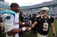 CHARLOTTE, NC - SEPTEMBER 16: Cam Newton #1 of the Carolina Panthers shakes hands with Drew Brees #9 of the New Orleans Saints after their game at Bank of America Stadium on September 16, 2012 in Charlotte, North Carolina. (Photo by Streeter Lecka/Get