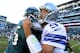 PHILADELPHIA, PA - OCTOBER 20: Tony Romo #9 of the Dallas Cowboys greets Vinny Curry #75 of the Philadelphia Eagles after the game on October 20, 2013 at Lincoln Financial Field in Philadelphia, Pennslyvania.The Dallas Cowboys defeated the Philadelphia E